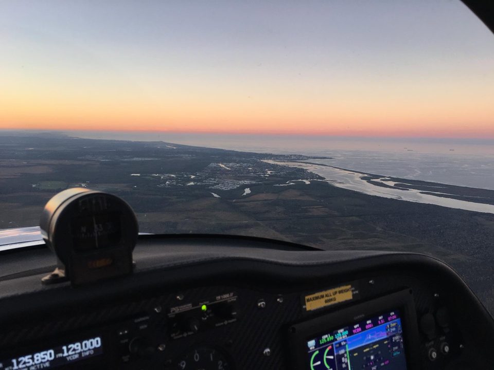Sunrise over the Central Queensland coast from the cockpit